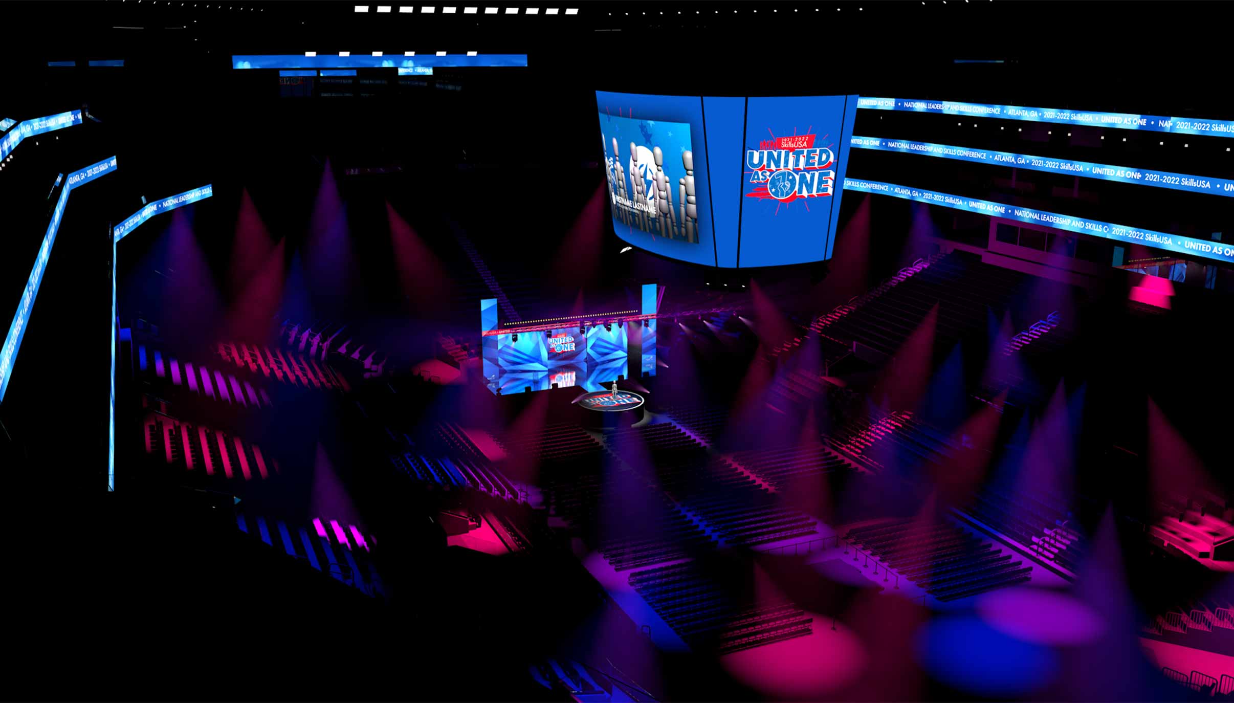 Empty auditorium with DECA momentum graphics projected on large screens