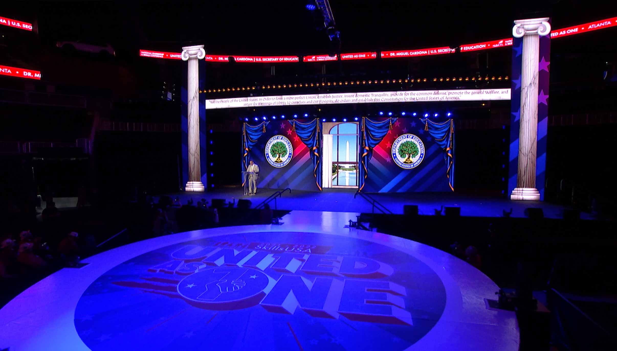 Digital render of the stage with officer awards being announced.